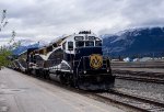 RMRX  8019 with  the westbound Rocky Mountaineer pre-departure in Jasper